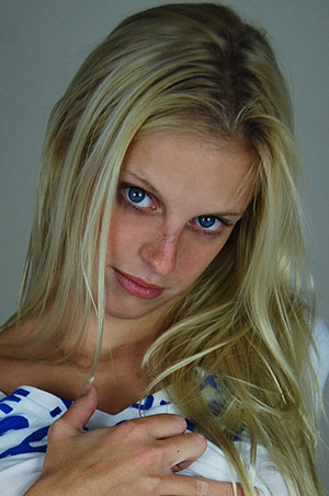 Blonde teen handjob model Karrey Simpson featured on HandDomination.